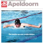 Foto van Tim die Vlinderslag zwemt op de voorpagina van het Regiodeel van de Stentor Apeldoorn